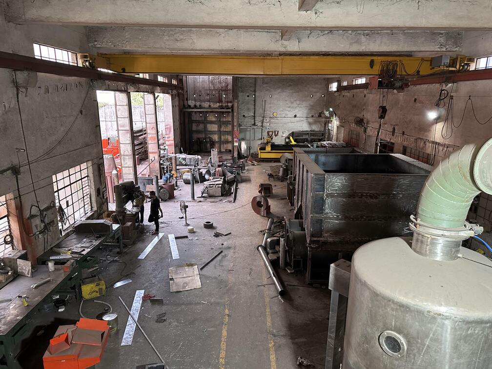 Conveyor belt assembly line at Rajeev Food Tech factory